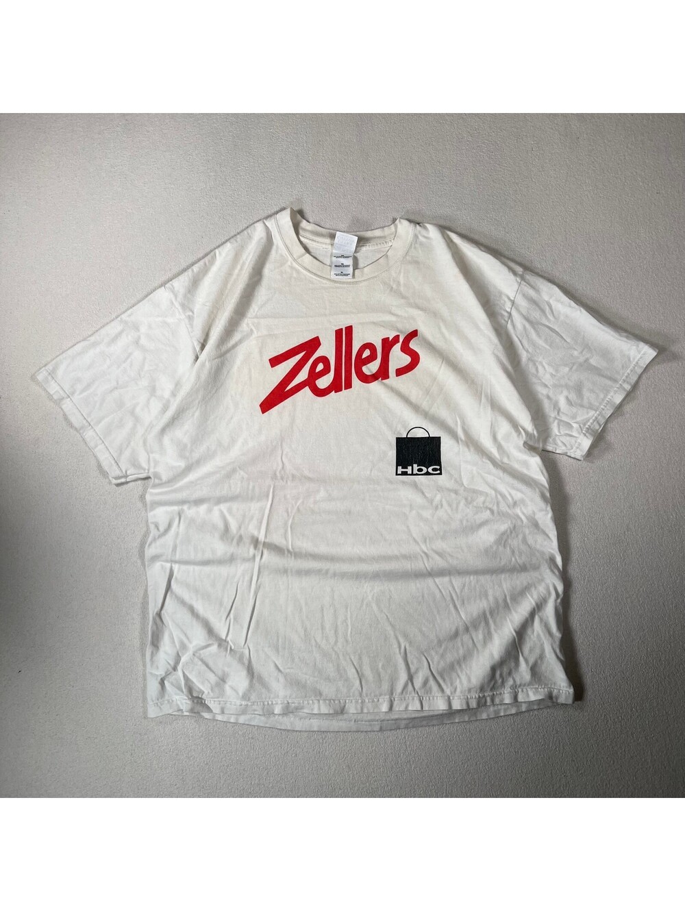 Vintage Zellers White Graphic Logo T-Shirt with Hbc XL